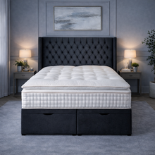 Load image into Gallery viewer, White mattress on a black bed frame in a bedroom setting with lamps and decor.